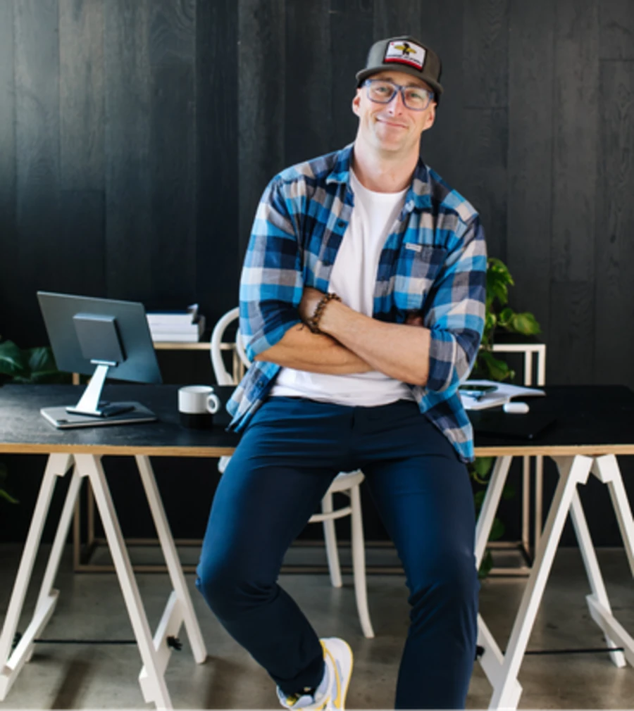 Steve leaning on a desk, mid-idea.